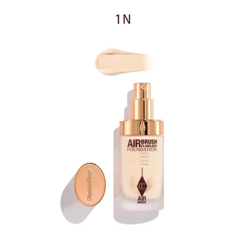 Charlotte Tilbury Airbrush Flawless Foundation bottle with applicator on a white background 1N