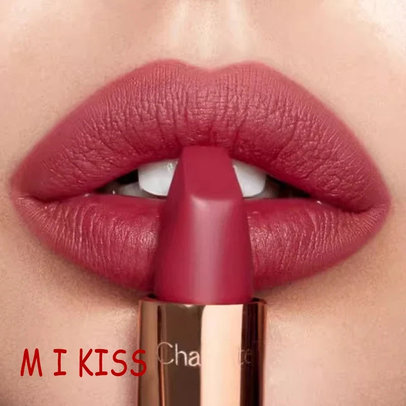 Close-up of a red lipstick being applied to lips with 'MI KISS' branding.