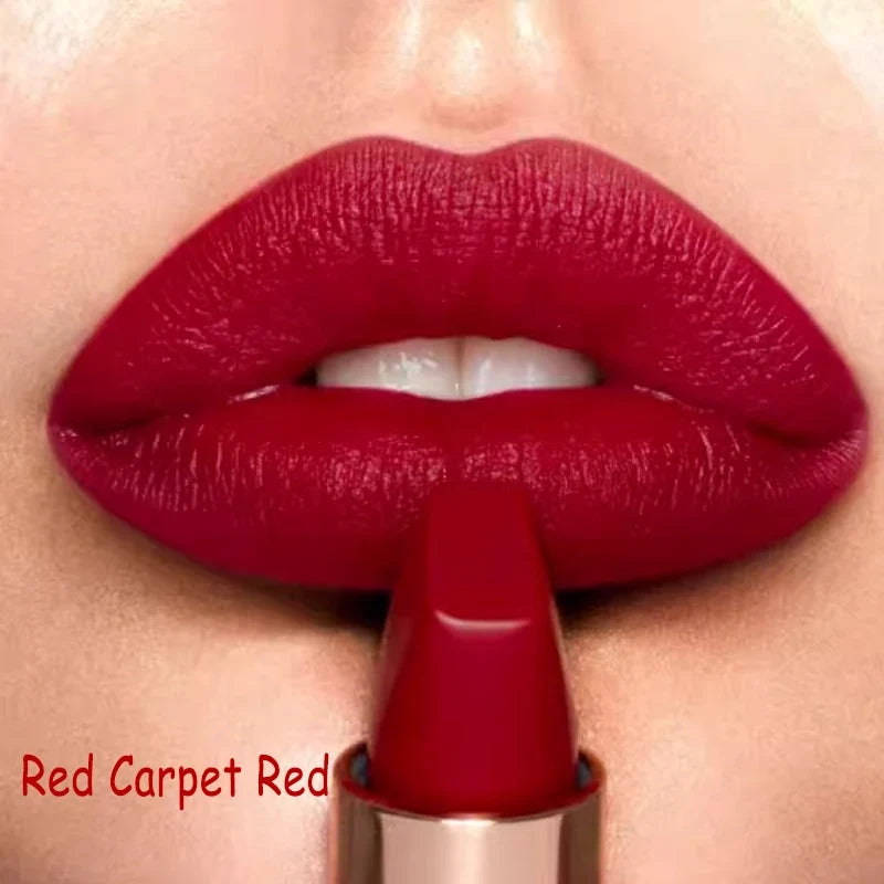 Close-up of red lipstick being applied to lips with 'Red Carpet Red' text.