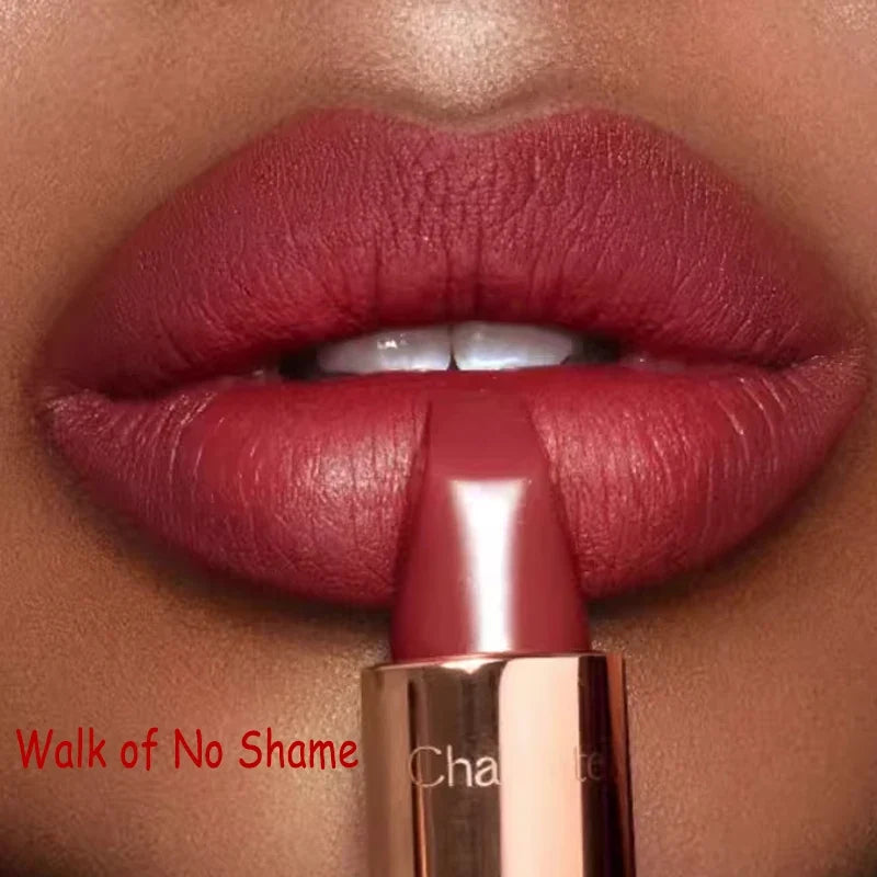 Close-up of a lipstick being applied to a lip with 'Walk of No Shame' text.