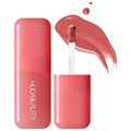 Huda Beauty Strawberry Cream liquid blush bottle