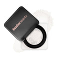 Hudabeauty compact powder with black lid on a white background