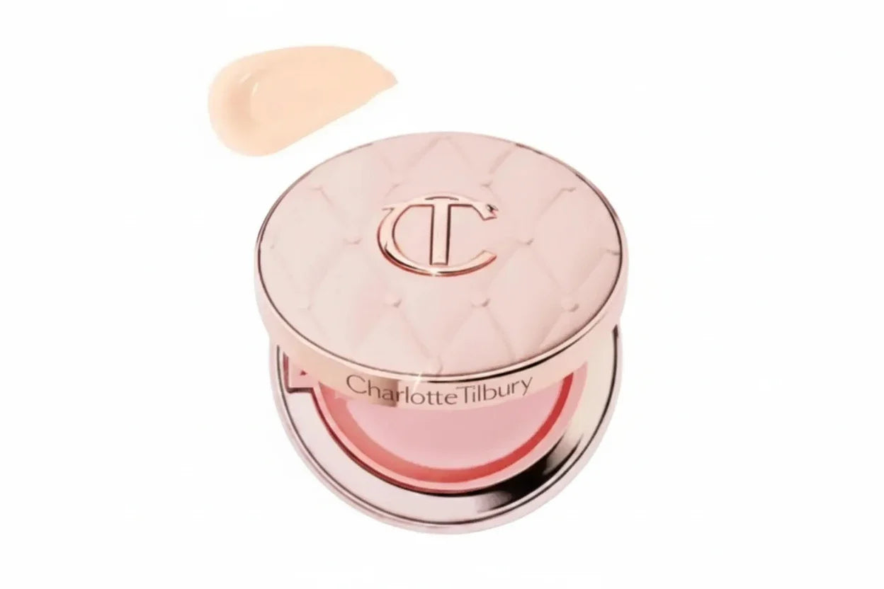 Charlotte Tilbury makeup product with a swatch on a white background