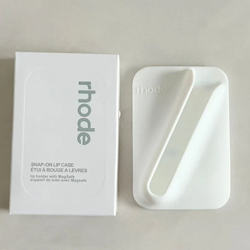White  lip case with 'rhode' branding on a gray background