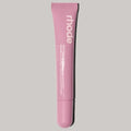 Pink cosmetic tube with 'rhode' branding on a light gray background