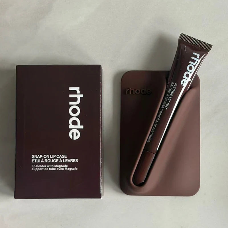 Brown lip case with 'rhode' branding on a light gray background